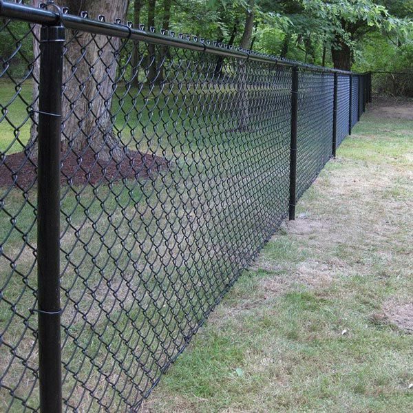 Black vinyl-coated chain link fence along a yard